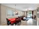 Open-concept floor plan from the dining room to the living room features plenty of natural light at 13256 N 153Rd Ln, Surprise, AZ 85379