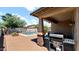 Inviting patio area overlooking the pool and lush backyard landscaping at 13256 N 153Rd Ln, Surprise, AZ 85379