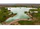 Breathtaking aerial view of a community lake with scenic walking trails and lush greenery at 14254 N Boxwood Ln # 158B, Fountain Hills, AZ 85268