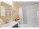 Bright bathroom features a shower-tub combination with white subway tile and modern sink at 14254 N Boxwood Ln # 158B, Fountain Hills, AZ 85268