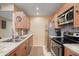 Efficient kitchen featuring a stainless steel fridge and countertops with tiled backsplash at 14254 N Boxwood Ln # 158B, Fountain Hills, AZ 85268