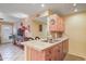 Kitchen area features a sink and tiled countertops with ample lighting and storage space at 14254 N Boxwood Ln # 158B, Fountain Hills, AZ 85268
