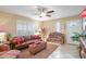 Sunny living room with tiled floors, comfortable seating, and a bright, airy feel at 14254 N Boxwood Ln # 158B, Fountain Hills, AZ 85268