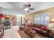 Open-concept living area featuring tile flooring, comfortable seating, and natural light at 14254 N Boxwood Ln # 158B, Fountain Hills, AZ 85268