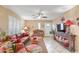 Bright living room featuring stylish seating, plantation shutters and ample space at 14254 N Boxwood Ln # 158B, Fountain Hills, AZ 85268