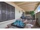 Charming covered patio with comfortable seating and stylish decor, ideal for relaxation at 14254 N Boxwood Ln # 158B, Fountain Hills, AZ 85268