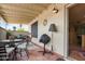 Relaxing covered patio with tile flooring, comfortable seating, and decorative outdoor accents at 14254 N Boxwood Ln # 158B, Fountain Hills, AZ 85268