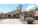 Inviting single-Gathering home displaying a well-maintained front yard with desert landscaping and a clean, modern facade at 14262 N 142Nd Ln, Surprise, AZ 85379