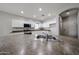 Spacious kitchen featuring a central island with a sink and modern appliances at 14262 N 142Nd Ln, Surprise, AZ 85379