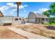 Property featuring a detached garage and an additional storage building in the backyard at 1451 E Brown Rd, Mesa, AZ 85203