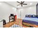 Bedroom featuring tiled floors and desk space at 1451 E Brown Rd, Mesa, AZ 85203
