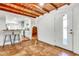 Bright and open entryway with tile floors that leads to a modern kitchen space at 1451 E Brown Rd, Mesa, AZ 85203