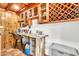 Organized home office with rustic wood finishes and a built-in wine rack at 1451 E Brown Rd, Mesa, AZ 85203