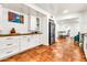 Bright open kitchen with butcher block countertops and stainless steel appliances, great for modern living at 1451 E Brown Rd, Mesa, AZ 85203