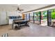 Large patio with a serving bar area, perfect for entertaining and enjoying the outdoors at 1451 E Brown Rd, Mesa, AZ 85203
