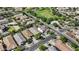 This aerial view showcases the neighborhood's layout, with tree-lined streets, green spaces and community features at 14793 W Surrey Dr, Surprise, AZ 85379