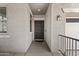 Welcoming front entry featuring a dark wood door and neutral toned walls at 14793 W Surrey Dr, Surprise, AZ 85379