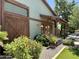 Detailed side exterior with well-maintained landscaping and wooden beam features that add a rustic charm at 14793 W Surrey Dr, Surprise, AZ 85379