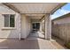 Covered patio area with brick flooring, perfect for outdoor seating and entertaining at 14793 W Surrey Dr, Surprise, AZ 85379