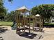 A well-equipped playground with climbing frames and slides, providing a fun and safe play area for children at 14793 W Surrey Dr, Surprise, AZ 85379