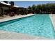 Full pool view showcasing its size and inviting clear water, perfect for swimming at 14793 W Surrey Dr, Surprise, AZ 85379