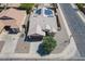 This home features solar panels, a desert landscape, and is situated on a corner lot at 1563 E Racine Dr, Casa Grande, AZ 85122