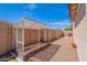 An empty garden plot ready for your creativity. Situated on a rock bed, with access to sunlight at 1563 E Racine Dr, Casa Grande, AZ 85122