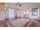 Bright living room featuring hardwood floors, neutral colors, and access to the backyard at 1563 E Racine Dr, Casa Grande, AZ 85122