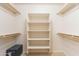 Walk-in closet with built-in shelving for optimal organization at 1563 E Racine Dr, Casa Grande, AZ 85122