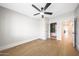 Minimalist bedroom with hardwood floors and an ensuite bathroom at 16008 N 60Th St, Scottsdale, AZ 85254