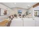 Open living room layout with fireplace, hardwood floors, and natural light at 16008 N 60Th St, Scottsdale, AZ 85254