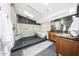 Modern bathroom with walk-in shower, dual vanity, and luxurious soaking tub at 16008 N 60Th St, Scottsdale, AZ 85254