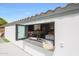 Featuring a pass-through window to an outdoor patio with a view of the kitchen sink at 16008 N 60Th St, Scottsdale, AZ 85254