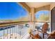 Cozy balcony with chairs, offering a relaxing outdoor living space with a neighborhood view at 16631 E El Lago Blvd # 212, Fountain Hills, AZ 85268