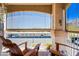 Cozy balcony with chairs, offering a relaxing outdoor living space with a neighborhood view at 16631 E El Lago Blvd # 212, Fountain Hills, AZ 85268
