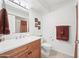 Well-lit bathroom features a vanity, mirror, and decorative hand towels at 16631 E El Lago Blvd # 212, Fountain Hills, AZ 85268