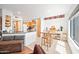 Inviting kitchen and dining nook with light wood cabinets and plenty of natural light from the adjacent window at 16631 E El Lago Blvd # 212, Fountain Hills, AZ 85268