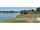 Scenic pond view with lush landscaping, creating a serene and picturesque environment at 16631 E El Lago Blvd # 212, Fountain Hills, AZ 85268