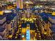 Stunning aerial view of the lit-up property at night, showcasing its expansive layout and surrounding cityscape at 17 W Vernon Ave # 412, Phoenix, AZ 85003