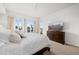 Bright and airy bedroom with stunning city views from the floor to ceiling windows, plus a ceiling fan at 17 W Vernon Ave # 412, Phoenix, AZ 85003