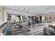 Well-equipped gym with modern exercise equipment and a mirrored wall for a complete fitness experience at 17 W Vernon Ave # 412, Phoenix, AZ 85003
