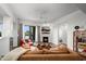 Cozy living room with a comfortable sofa, fireplace, city view, and modern decor at 17 W Vernon Ave # 412, Phoenix, AZ 85003