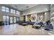 Lounge with seating, tables, and multiple windows for natural light at 17 W Vernon Ave # 412, Phoenix, AZ 85003