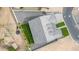 Drone shot of a perfectly manicured backyard showing a lawn and surrounding landscape at 1704 E Melrose St, Mesa, AZ 85203