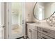 Elegant bathroom vanity with modern sink, faucet, and access to the outside patio at 1704 E Melrose St, Mesa, AZ 85203