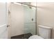 Modern bathroom shower features a glass door and white subway tile at 1704 E Melrose St, Mesa, AZ 85203