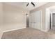Bedroom featuring neutral walls, carpet floors, and double door closet at 1704 E Melrose St, Mesa, AZ 85203