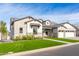 Attractive home featuring well-kept lawn, blooming bushes, and a brick and siding facade at 1704 E Melrose St, Mesa, AZ 85203