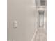 Hallway with light walls and tile flooring that leads to the rooms at 1704 E Melrose St, Mesa, AZ 85203
