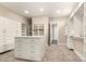 Expansive walk-in closet with custom shelving and drawers, designed for maximum storage and organization at 1704 E Melrose St, Mesa, AZ 85203
